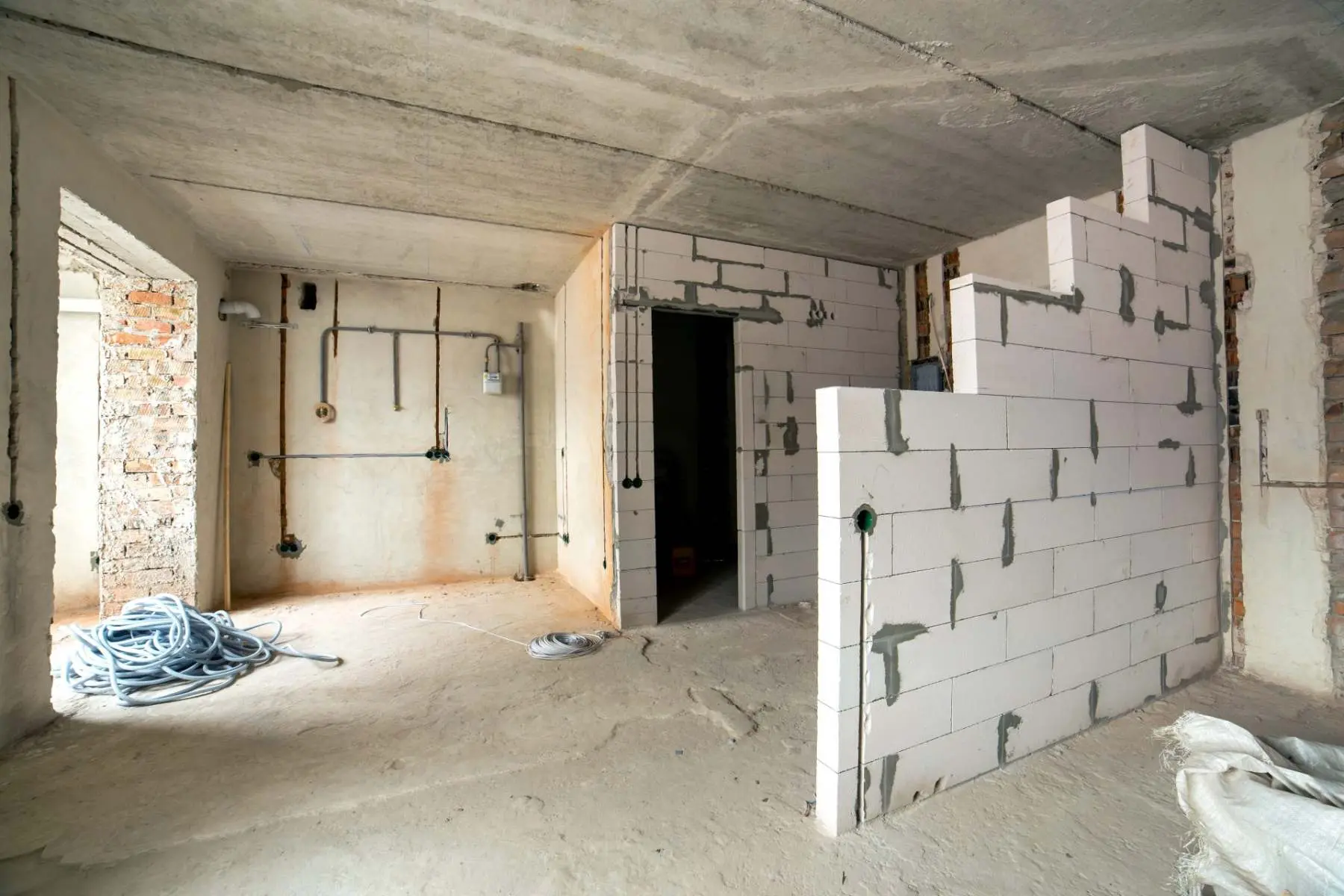 Apartment shell mid-conversion inside a former commercial building Welgo Builders Ltd Manchester