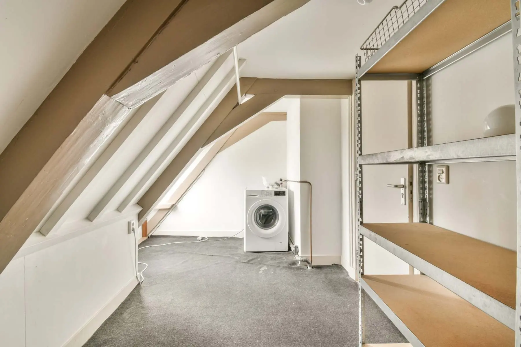 Modern shared laundry room fitted during an HMO conversion Welgo Builders Ltd Manchester