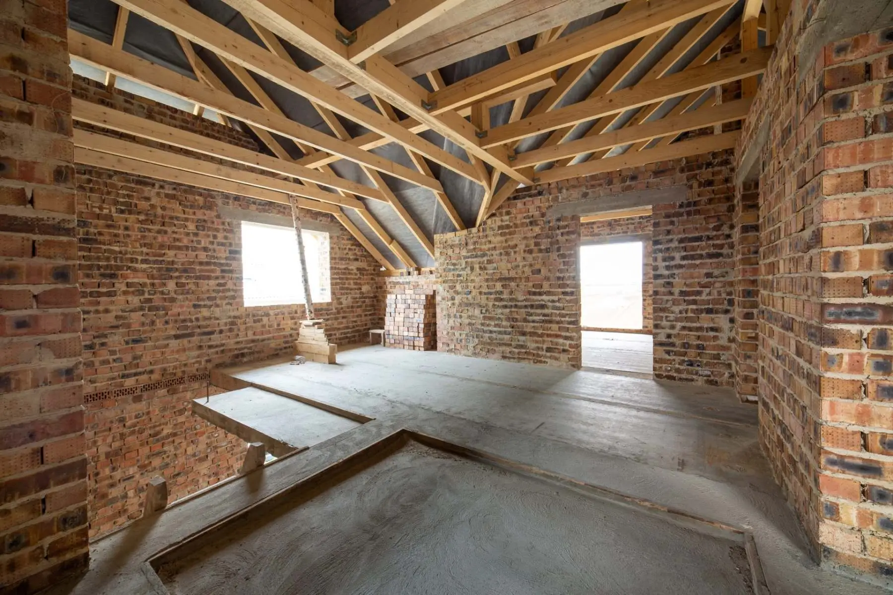 Interior of an unfinished brick building Welgo Builders Ltd Salford