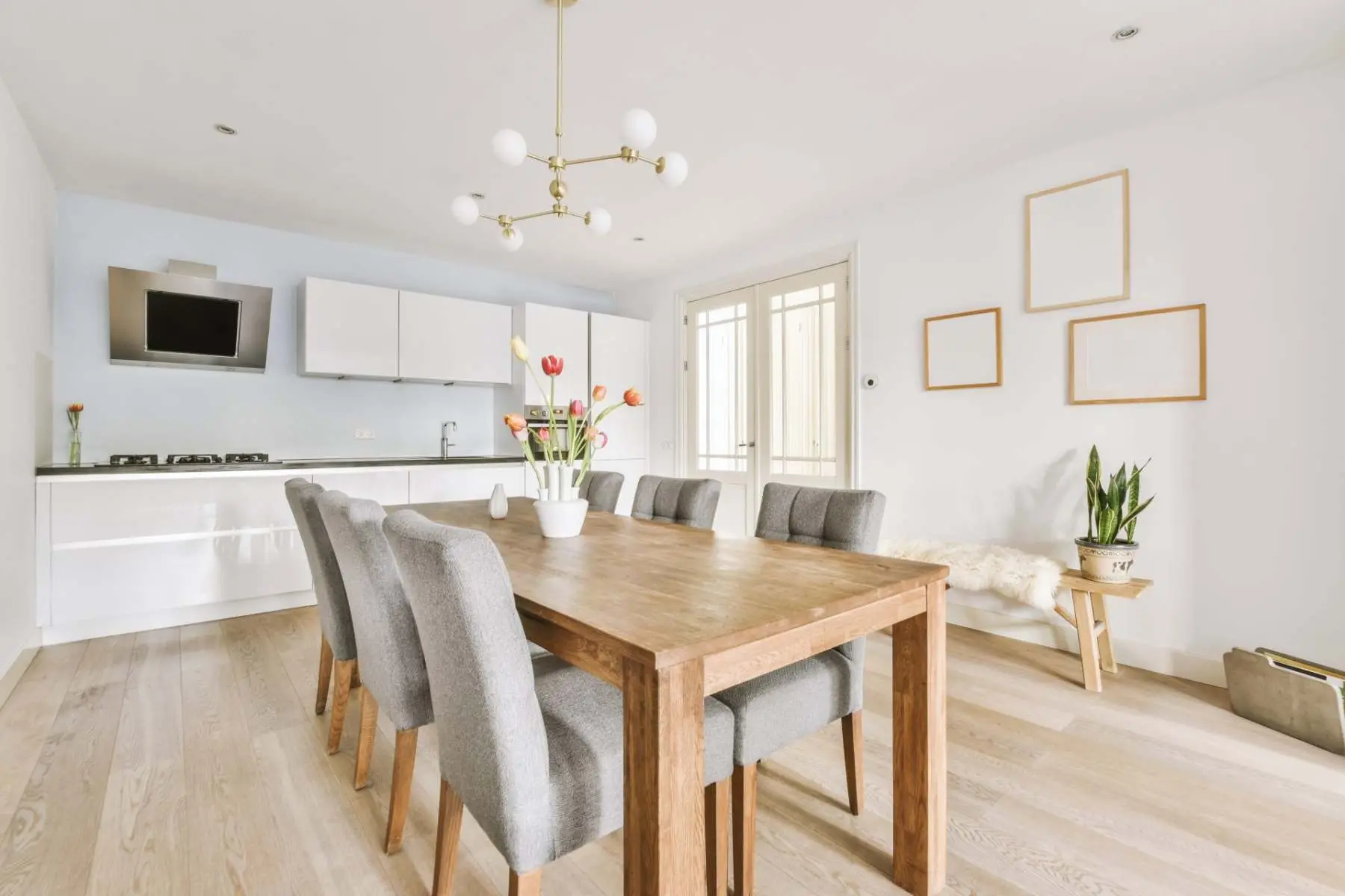 Kitchen and dining zone in a studio apartment completed by Welgo Builders Ltd Manchester