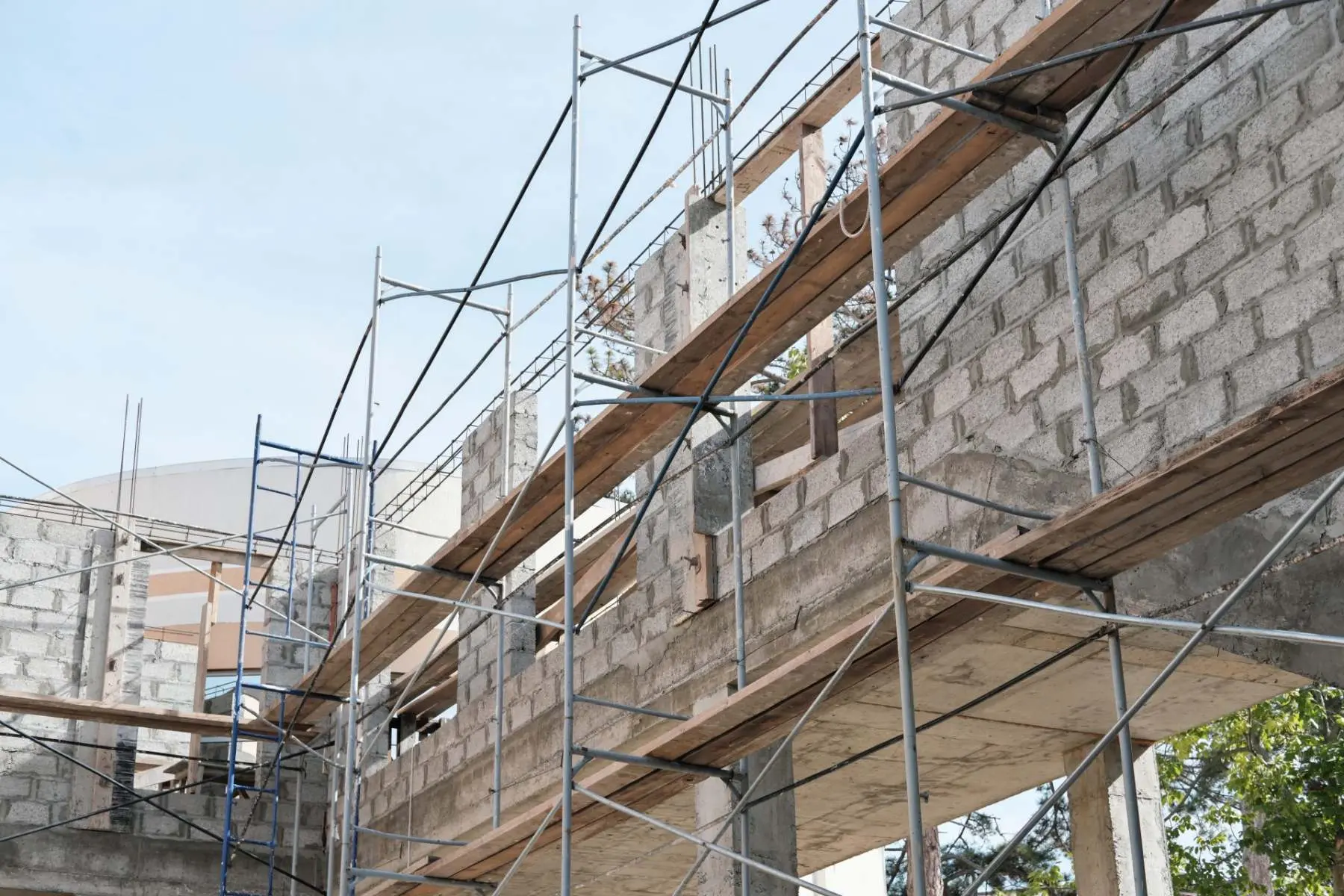Scaffolding around a building during a commercial refurbishment Welgo Builders Ltd Manchester